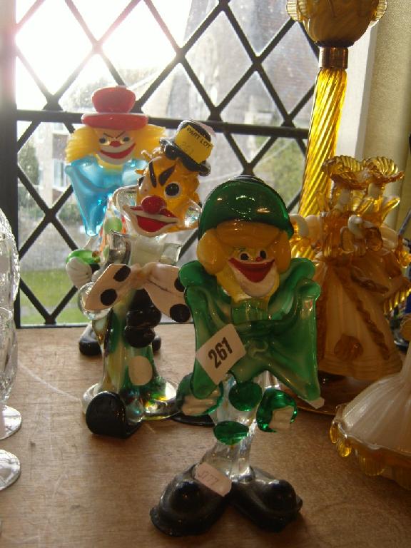 Appraisal: A collection of three Venetian glass clowns including an accordion