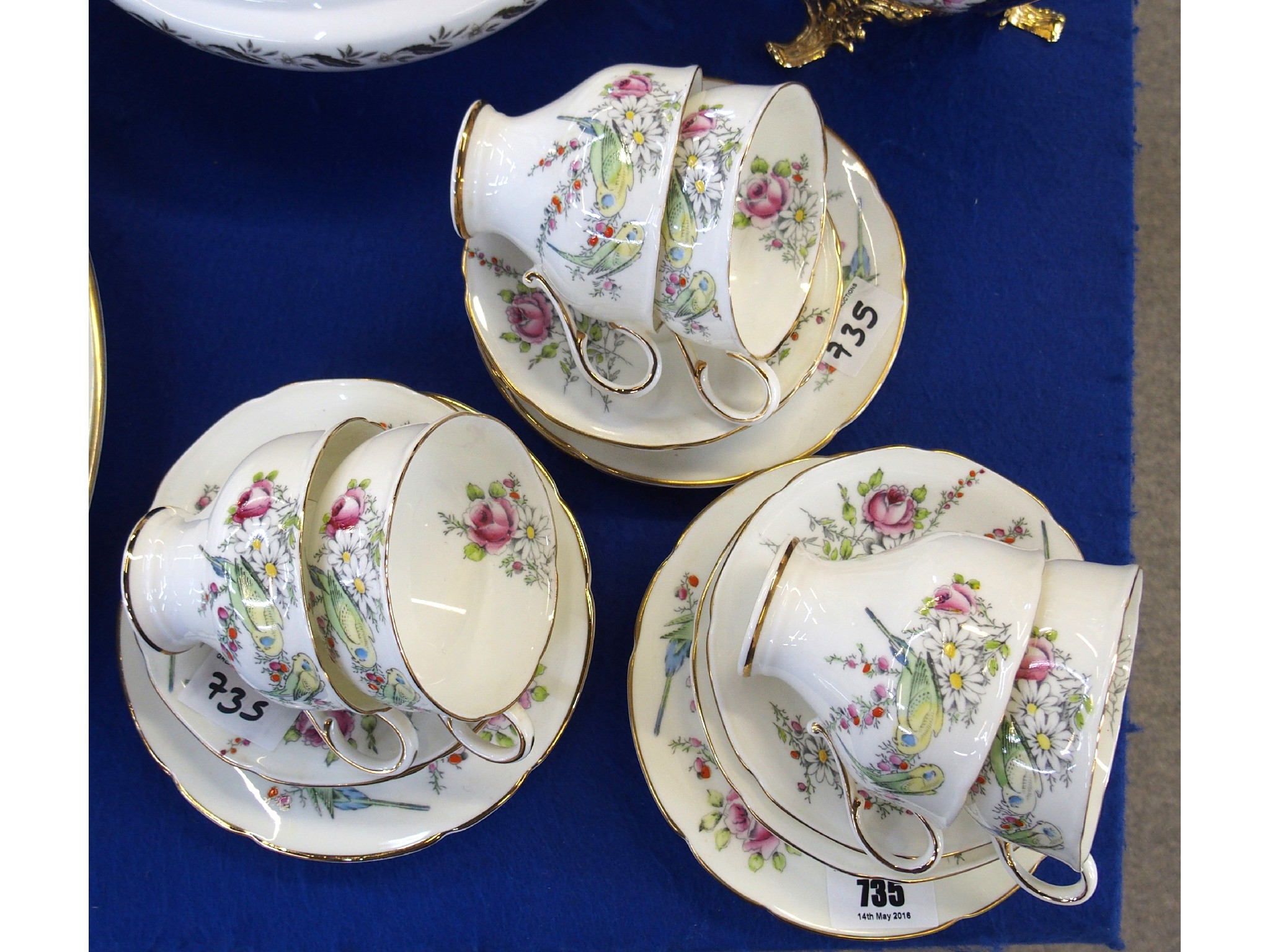 Appraisal: Paragon china tea cups saucers and plates decorated with budgies