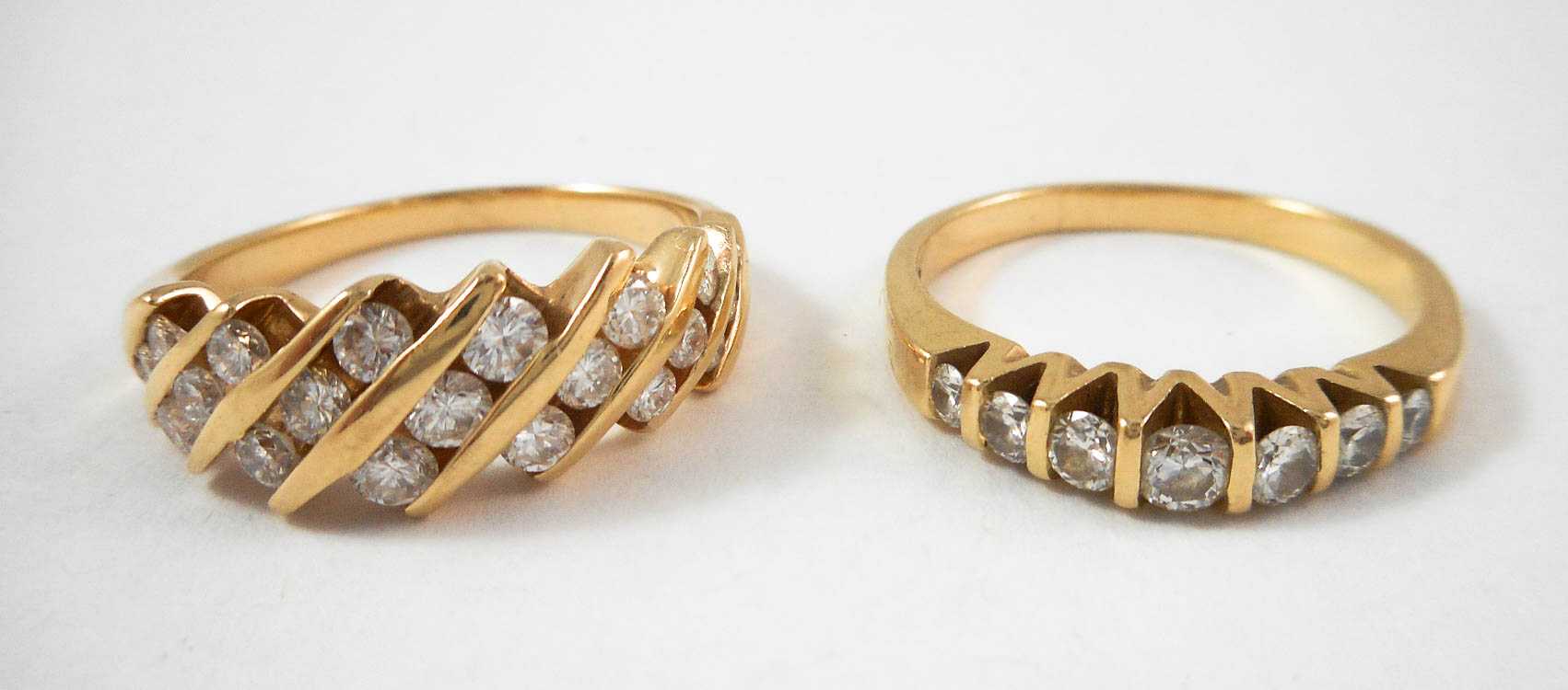 Appraisal: TWO DIAMOND AND FOURTEEN KARAT GOLD RINGS including a size