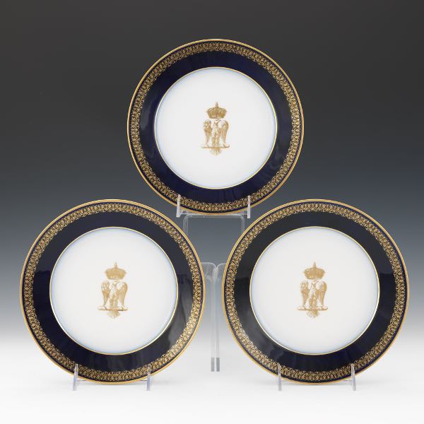 Appraisal: THREE SEVRES GILT COBALT BLUE NAPOLEONIC EAGLE PORCELAIN PLATES CA