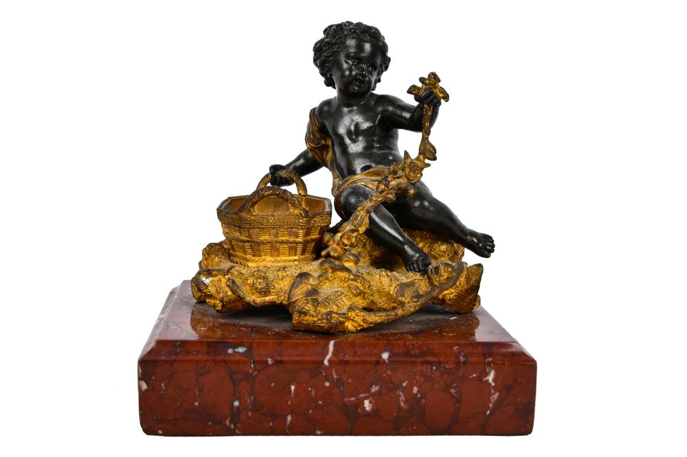 Appraisal: FRENCH PATINATED GILT BRONZE FIGUREunsigned modeled as a cherub with