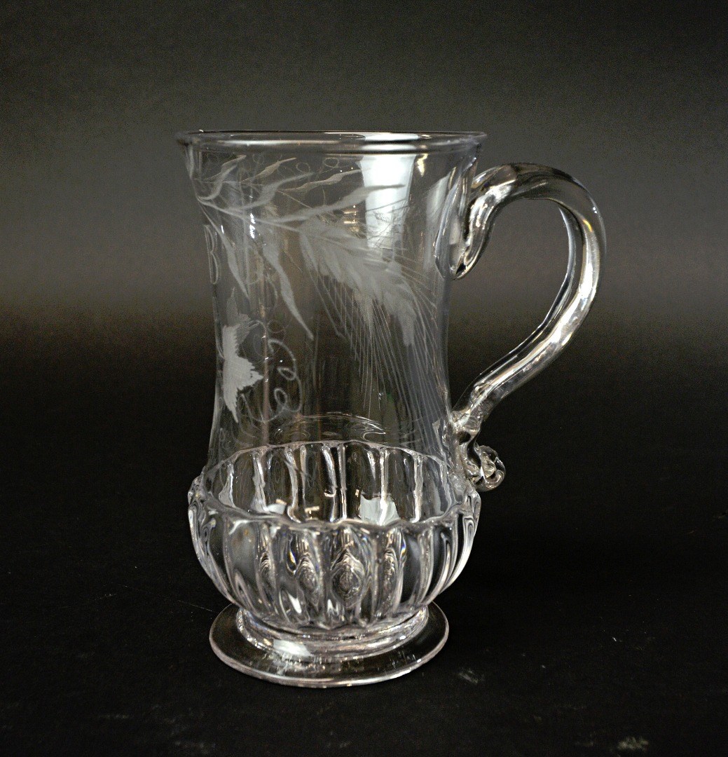 Appraisal: An English glass ale tankard late th century the waisted