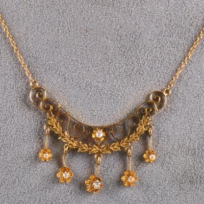 Appraisal: EDWARDIAN K GOLD DIAMOND GARLAND NECKLACE Crescent panel suspends fringe