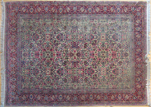 Appraisal: Kirman carpet ca with overall floral design on an ivory