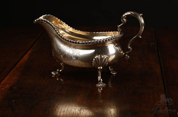 Appraisal: A George III sterling sauce boat Johnston A George III