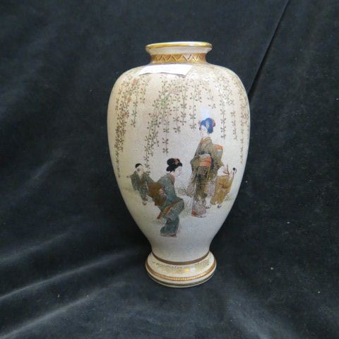 Appraisal: Japanese Satsuma Pottery Vase finely detailed wisteria villagers signed tall