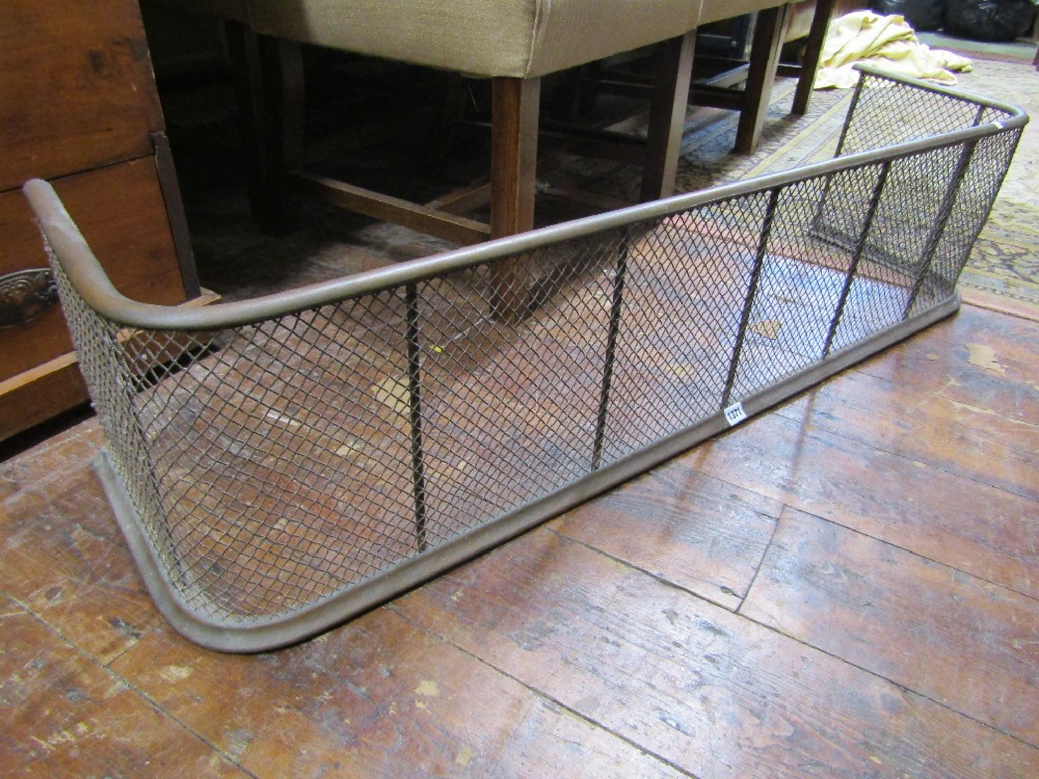 Appraisal: A Victorian brass frame and wirework fender plus one other