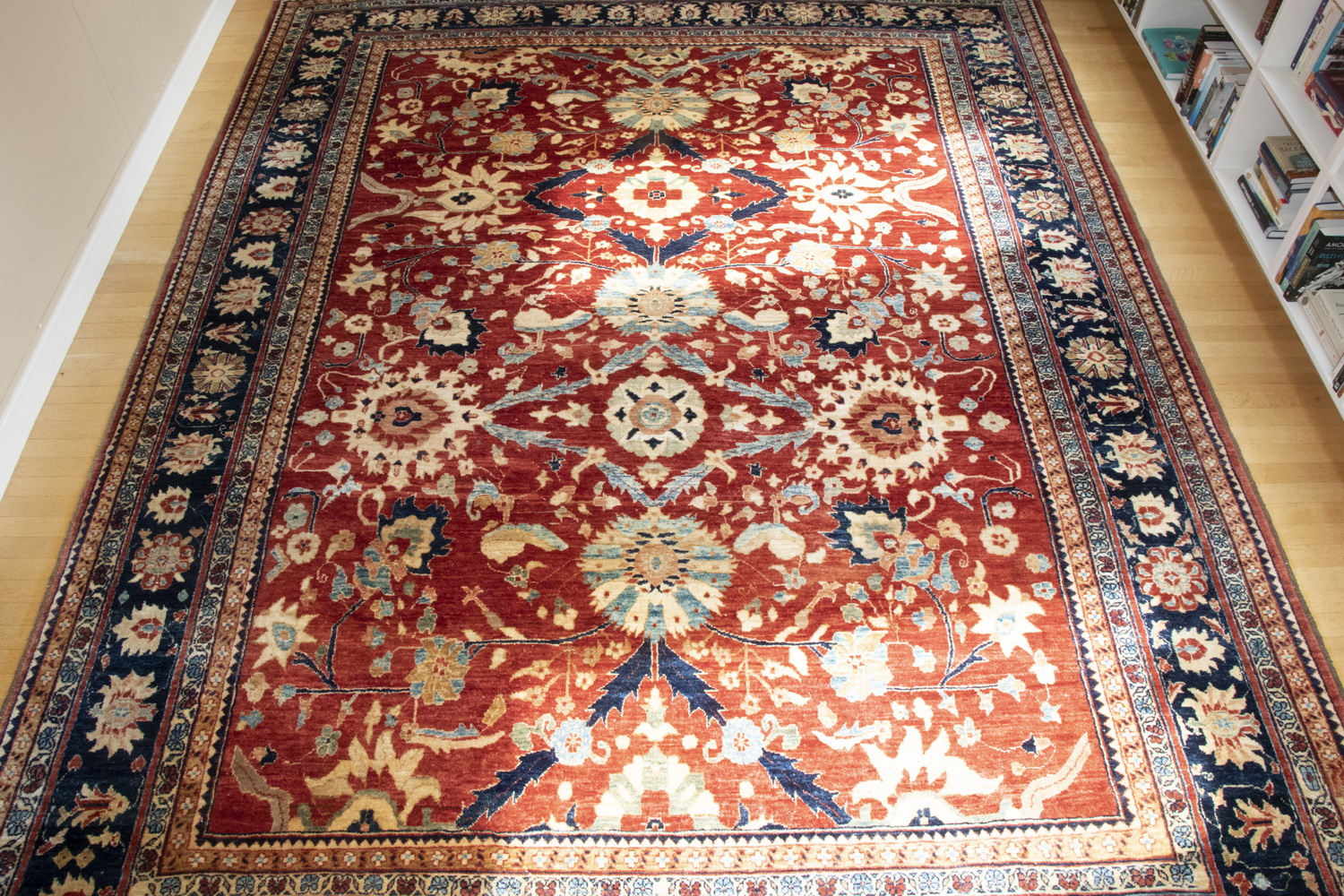 Appraisal: RED CARPET WITH MEDALLION DESIGN A large area carpet with