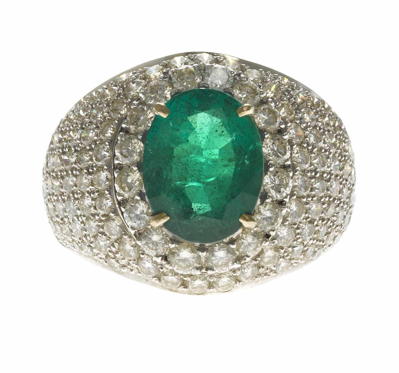 Appraisal: An emerald and diamond ring oval-shaped emerald weighing approximately carats