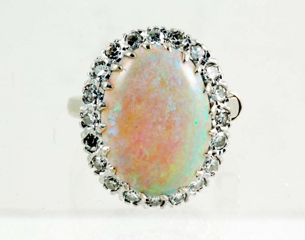 Appraisal: Opal and diamond ring in marked K white gold Approximately