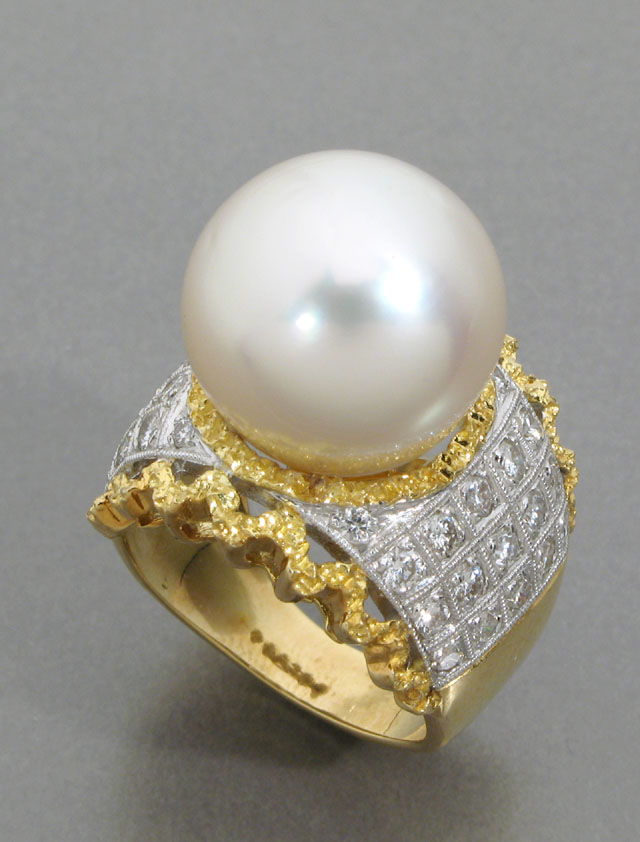 Appraisal: SOUTH SEAS PEARL DIAMOND AND EIGHTEEN KARAT GOLD DINNER RING