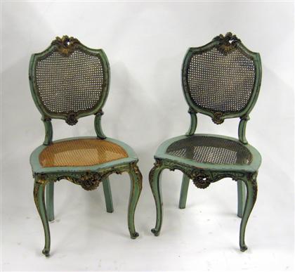 Appraisal: Pair of Italian style parcel gilt painted and caned side