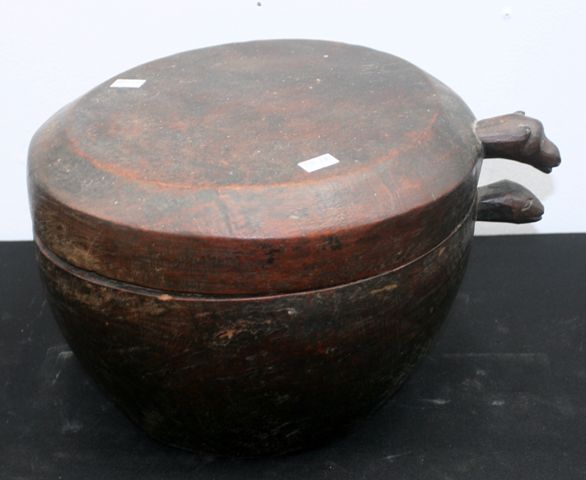 Appraisal: A carved wooden lidded bowl the base and lid with