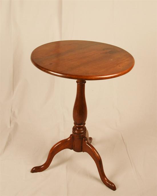 Appraisal: An American Mahogany Tilt-top Candle Stand the top round over