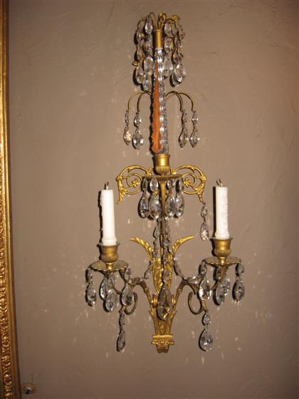 Appraisal: Pair of Neoclassical gilt bronze prism hung three light wall