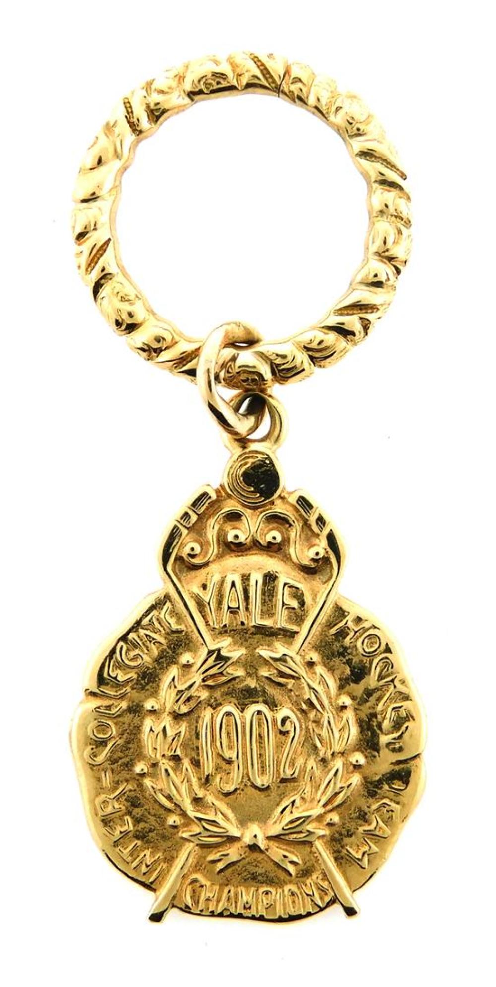 Appraisal: JEWELRY K Yale hockey championship medal one stamped K yellow