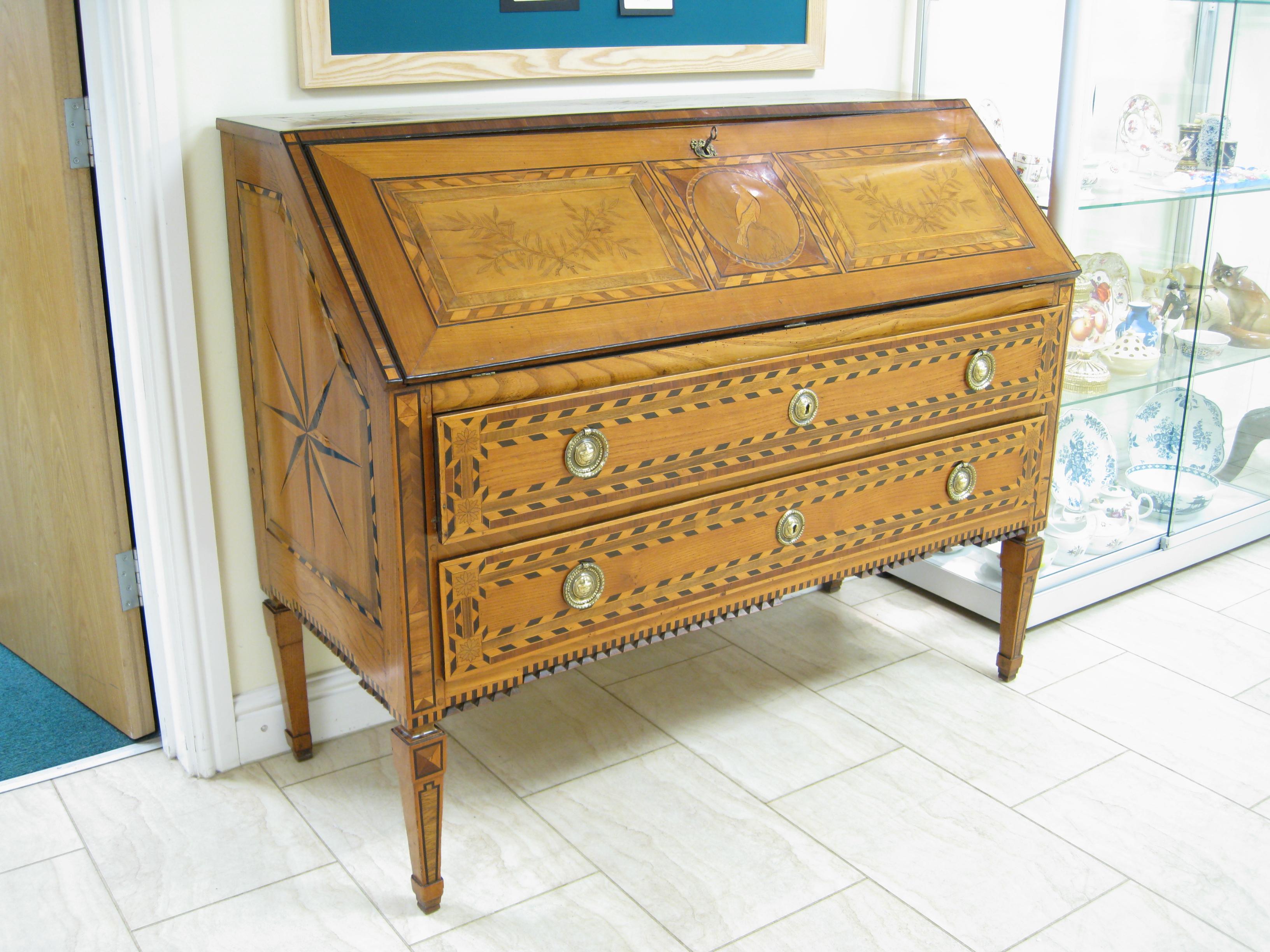 Appraisal: A late th Century Continental Marquetry Bureau with finely fitted