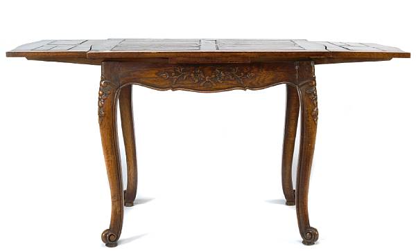 Appraisal: A Louis XIII style draw leaf dining table height in