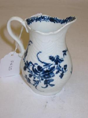 Appraisal: A FIRST PERIOD WORCESTER PORCELAIN JUG of feather moulded silver