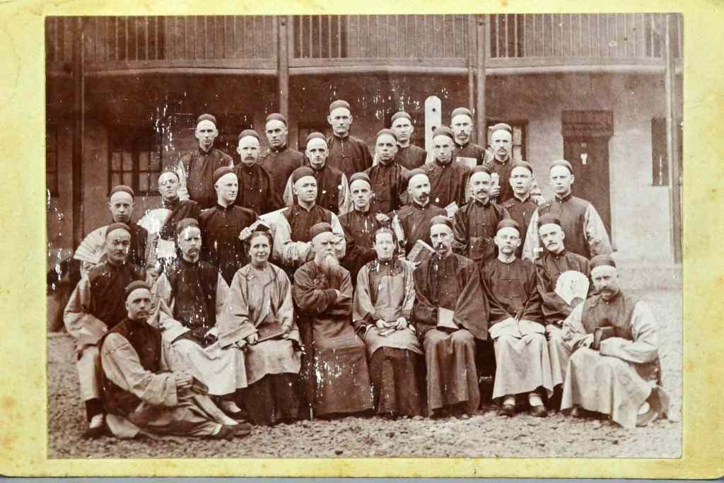 Appraisal: Chinese Black White PhotosOne photo of males and females ''H