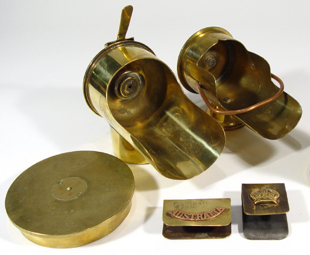 Appraisal: Five military trench art items - Two brass coal scuttle