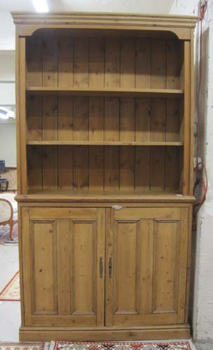 Appraisal: PINE BOOKCASE ON CABINET antique reproduction the top section fitted