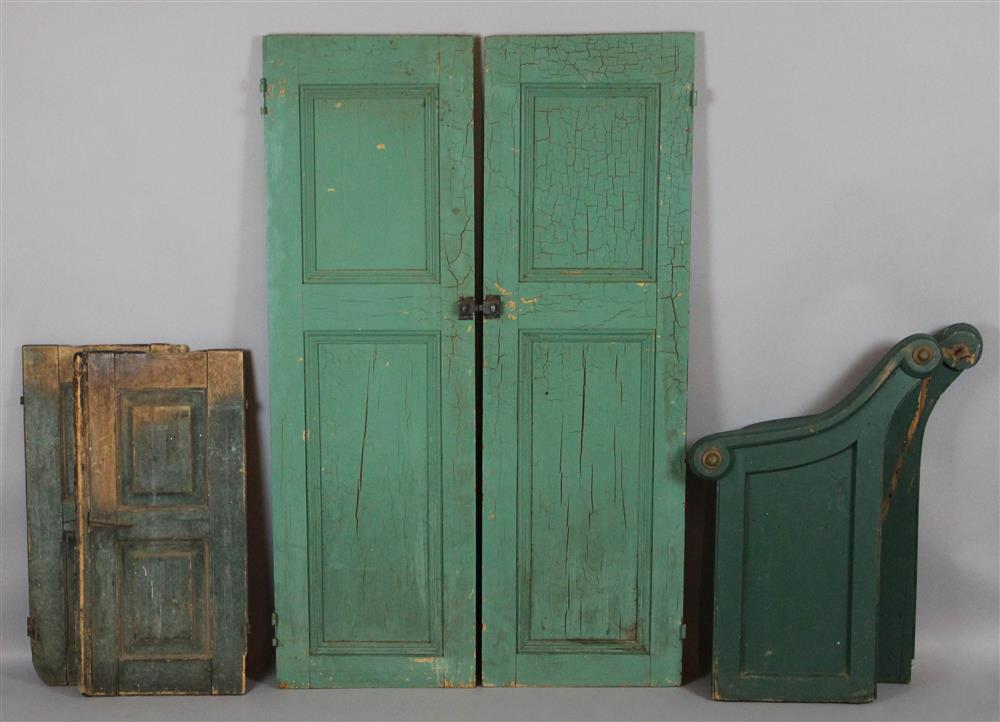 Appraisal: TWO PAIRS OF AMERICAN PAINTED VINTAGE PANELED CABINET DOORS the