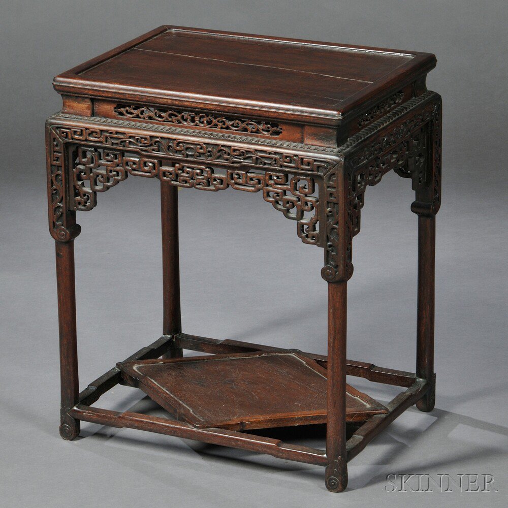 Appraisal: Rectangular Wood Stand China hardwood the shoulder and pierced apron