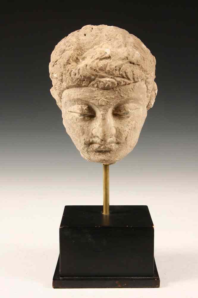 Appraisal: HEAD OF BUDDHA - Polychrome Limestone Head of Buddha Gandhara