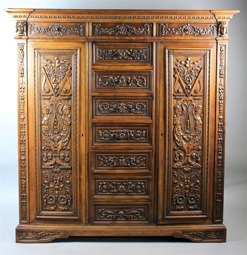 Appraisal: RENAISSANCE REVIVAL CARVED WALNUT DRESSING CUPBOARD having a molded and