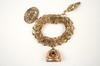 Appraisal: BRACELET - K yellow gold bracelet with three charms an