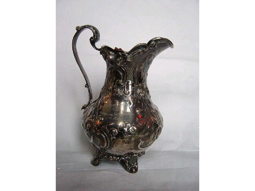 Appraisal: A Victorian silver milk jug of baluster form with loop