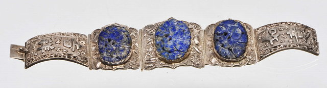 Appraisal: A CHINESE SILVER BRACELET with five hinged panels three set