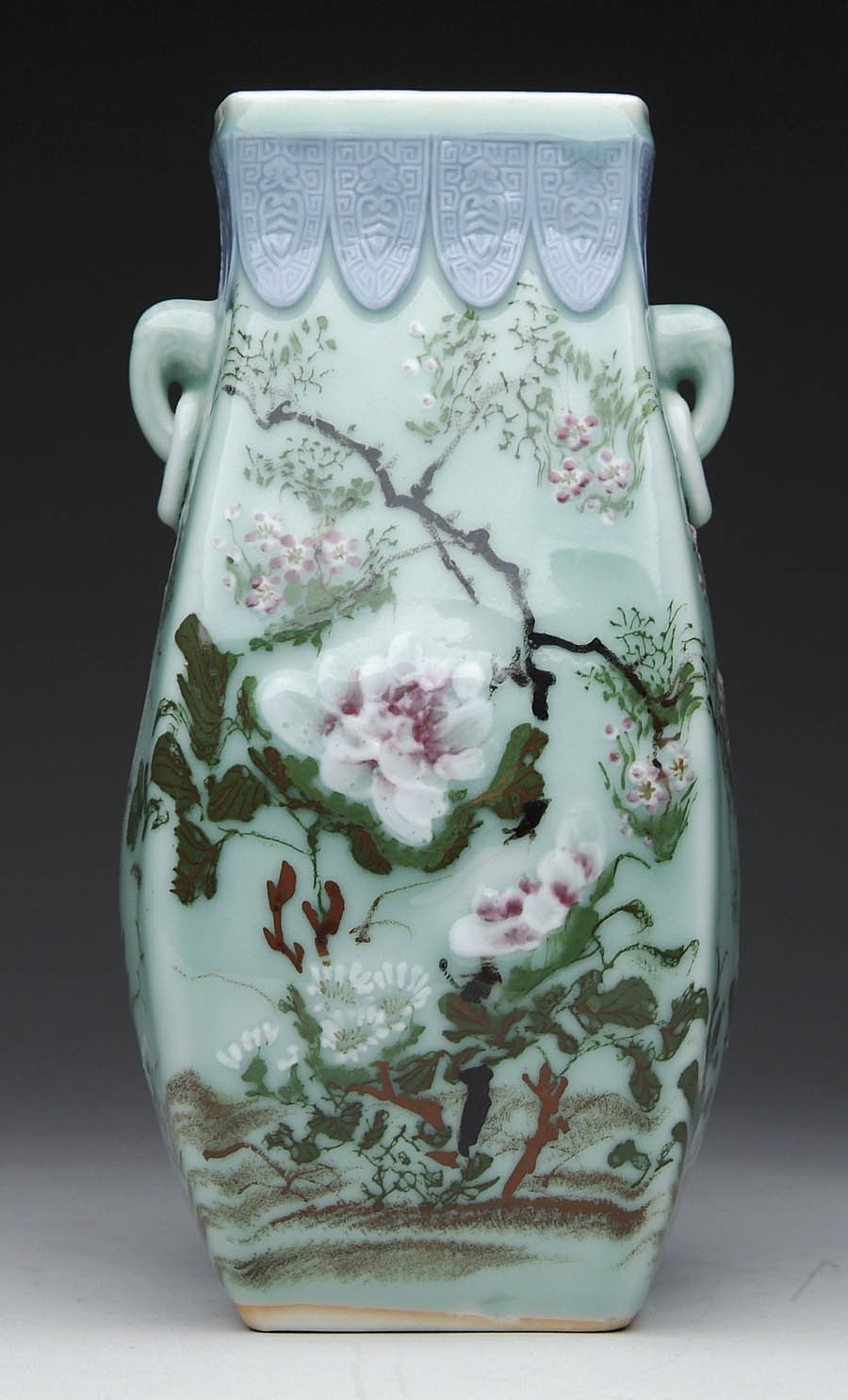 Appraisal: DECORATED CELADON VASE Decorated with colorful flowering branches and ground