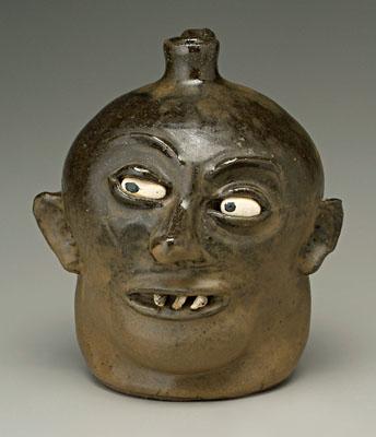 Appraisal: Lanier Meaders face jug alkaline glaze stoneware ceramic eyes three