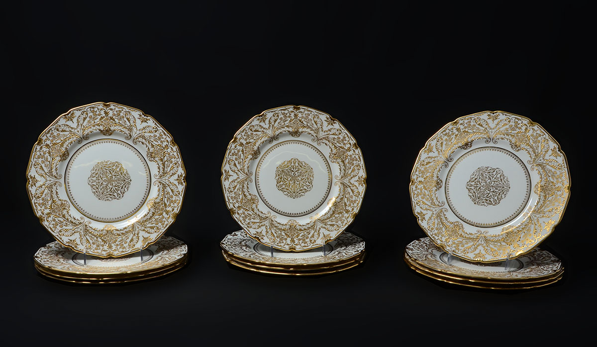 Appraisal: ROYAL DOULTON GOLD TRIM DINNER PLATES dinner plates in the