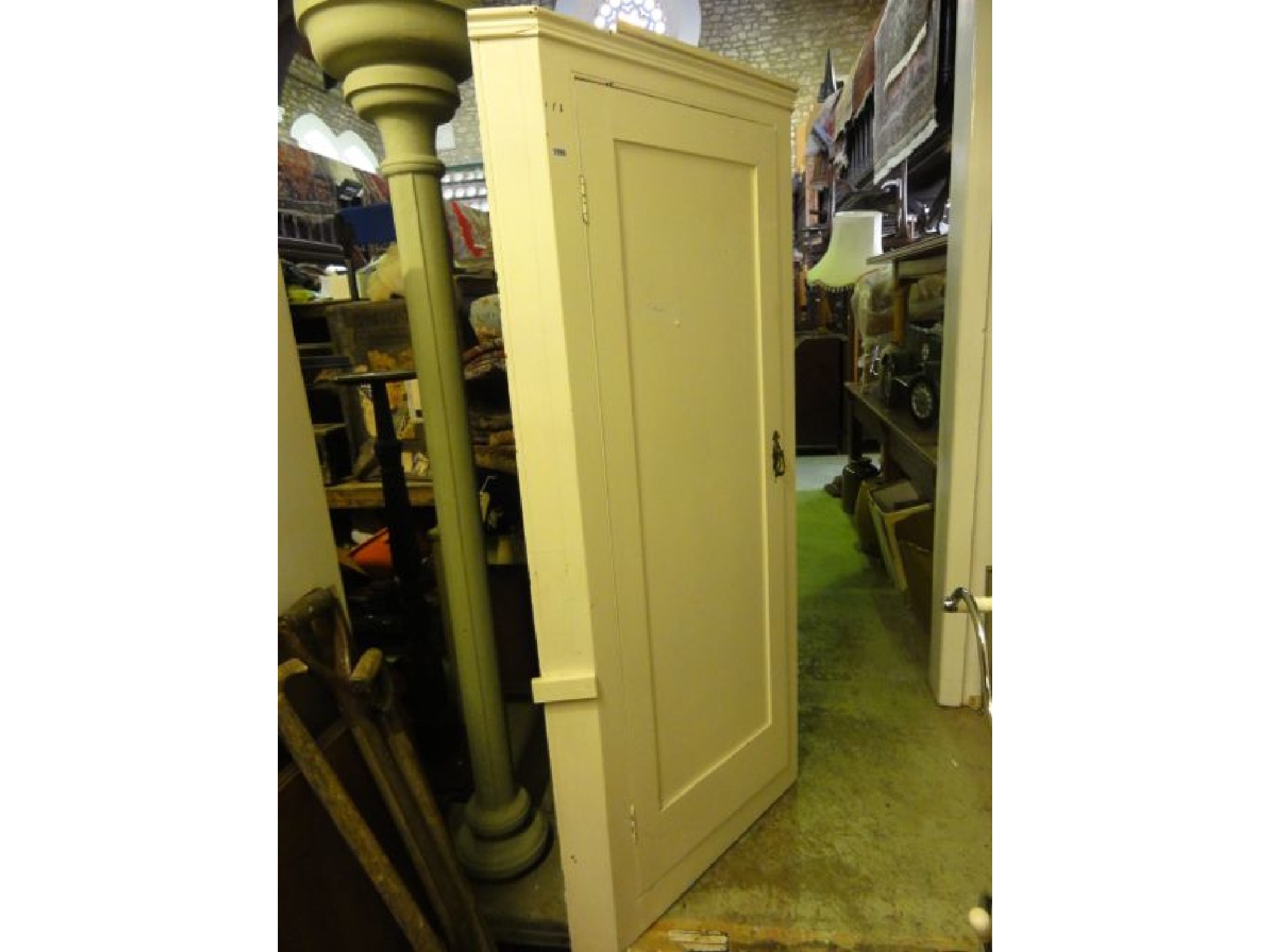 Appraisal: An Edwardian pine freestanding corner cupboard with painted finish enclosed