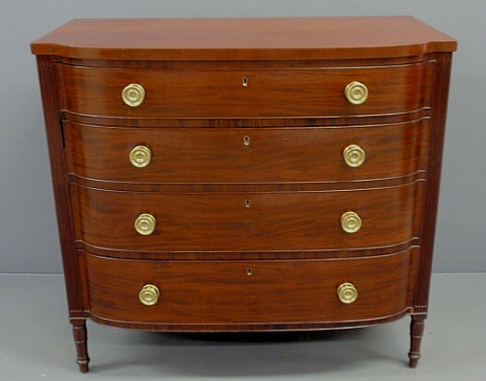 Appraisal: Sheraton mahogany bow-front chest of drawers c with reeded stiles