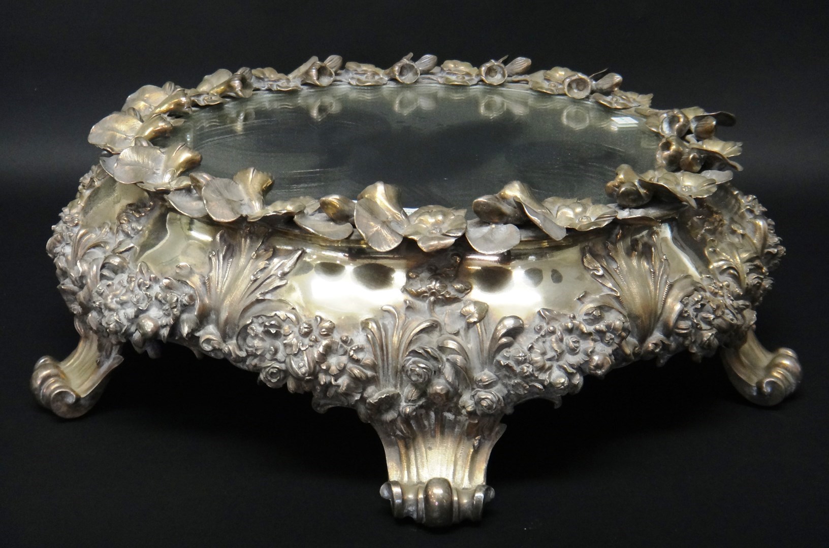 Appraisal: A silver plated mirrored plateau base circa probably by Elkington