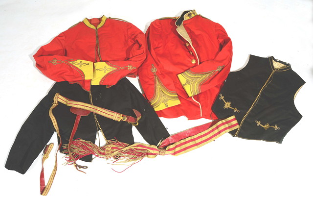 Appraisal: A COLLECTION OF OLD MILITARY UNIFORM to include two red