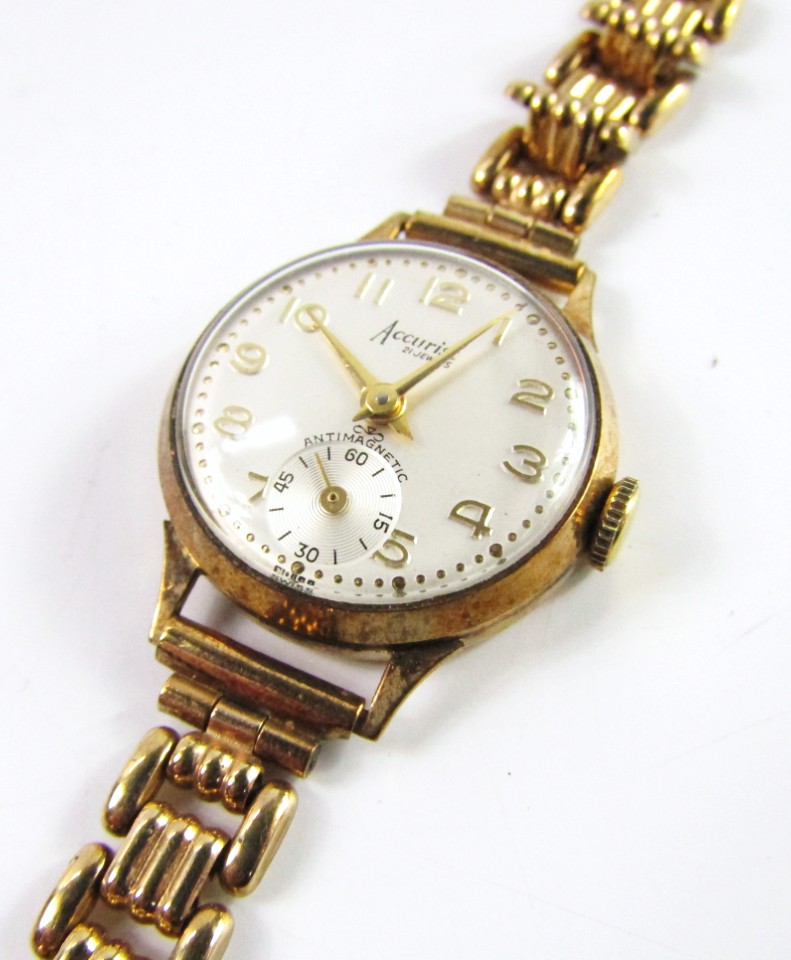 Appraisal: An Accurist ct gold bracelet watch with mechanical movement upon