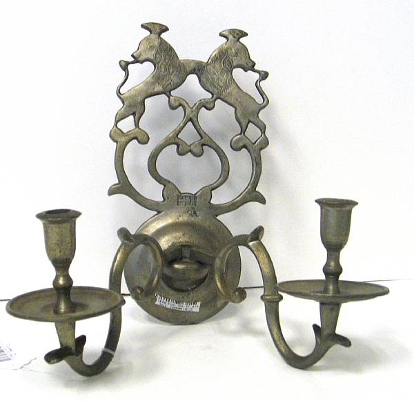 Appraisal: A pair of Dutch Baroque style pewter two-light wall sconces