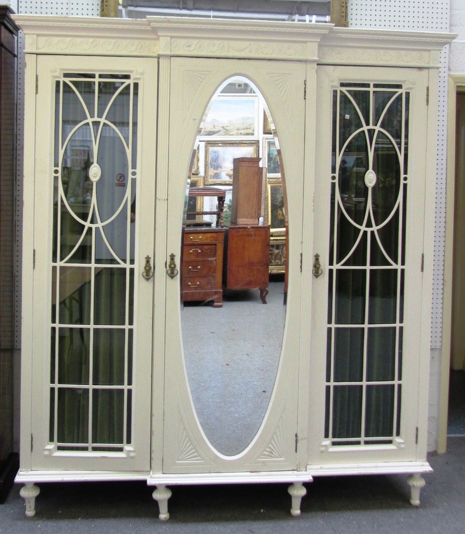 Appraisal: A late th century white painted beech triple wardrobe cm