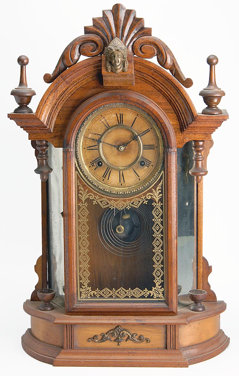 Appraisal: VICTORIAN WATERBURY SHELF CLOCK in walnut with domed top finials