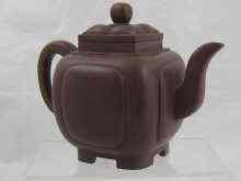 Appraisal: A Chinese Yixing teapot of rounded cube shape impressed mark