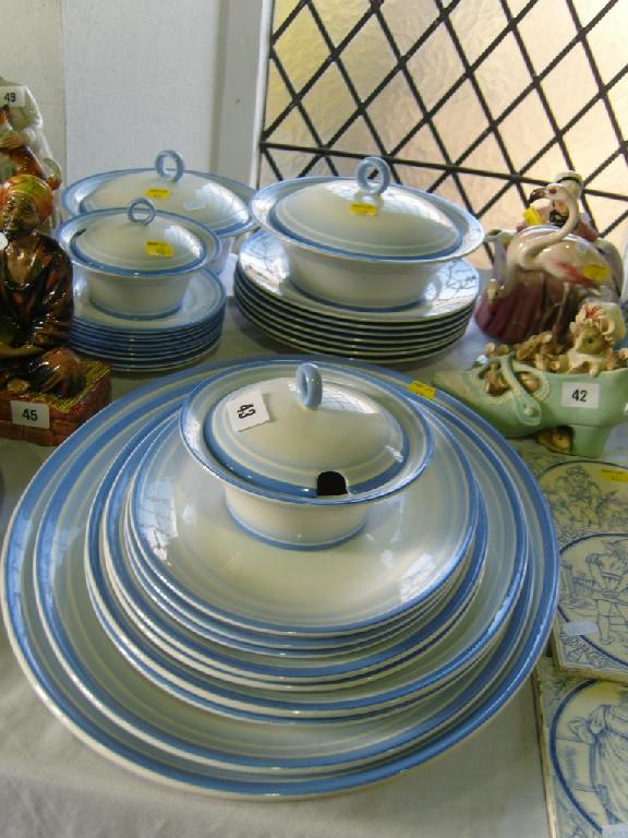 Appraisal: A collection of Shelley dinner wares with graduated blue border