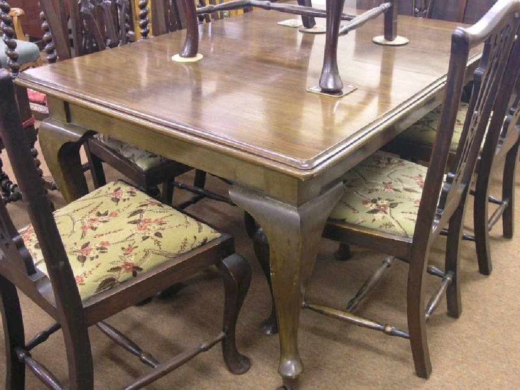 Appraisal: An early th century mahogany wind-action dining table with two