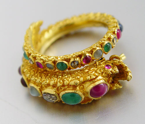 Appraisal: K FIGURAL SERPENT RING WITH GEMSTONES K yellow gold ring