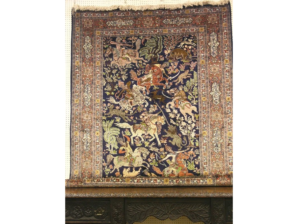 Appraisal: An Indian silk rug central design of numerous huntsmen on