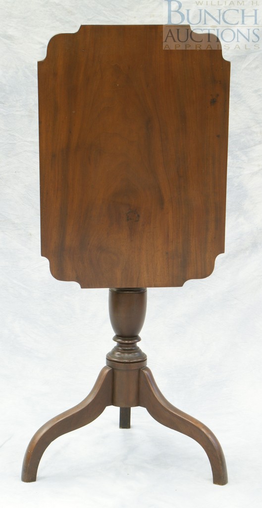 Appraisal: Mahogany Spider leg tilt top candle stand rectangular top with